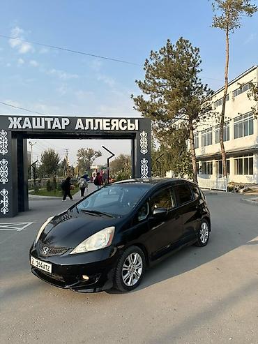 самое бортовой: Honda Fit: 2009 г., 1.5 л, Автомат, Бензин, Хэтчбэк — 2