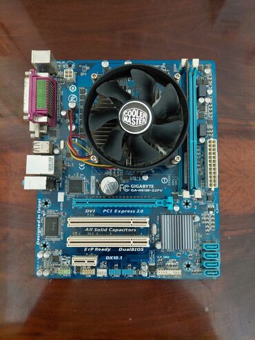 Qida blokları: Gigabyte GA-H61M-S2PV ana platası, DVI və PCI Express 2.0 yuvalarına