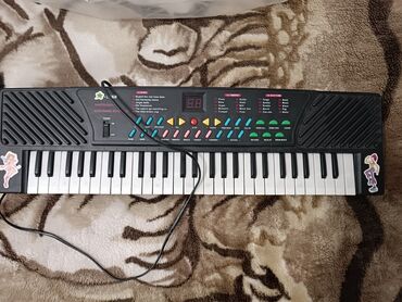 подставка для синтезатора: Продаю детское игрушечное пианино. В рабочем состоянии