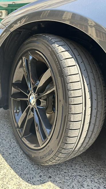 sailun teker: BMW üçün orijinal qara yüngül lehimli disklər və yay təkərləri dəsti — 1