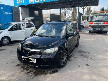 100000 авто: Mazda Demio: 2003 г., 1.3 л, Механика, Бензин, Хэтчбэк