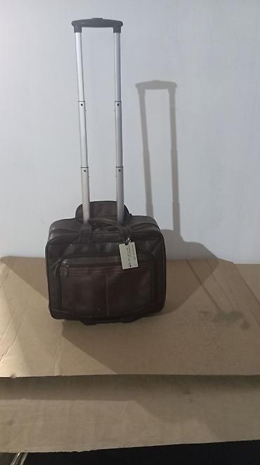 Təkərli səyahət/iş çantası, qəhvəyi rəngdə. Kompakt ölçülü olub lalafo.az -da Təkərli səyahət/iş çantası, qəhvəyi rəngdə. Kompakt ölçülü olub