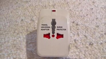 Kablovi i adapteri: Universalni travel adapter na lalafo.rs — 1 Kablovi i adapteri: Universalni travel adapter — 1