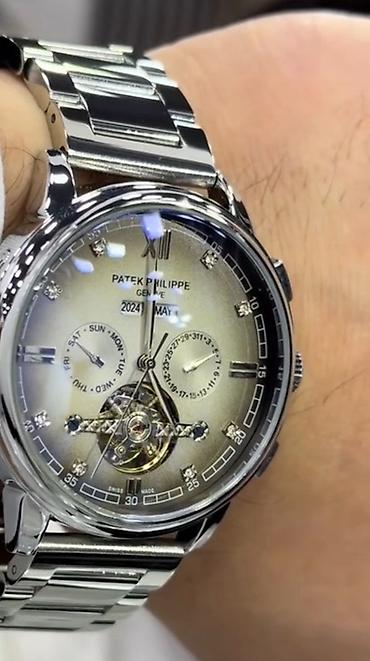 apple watch series 1: Patek Philippe kişi qol saatı – zərif mexanika və klassik dizayn - — 1
