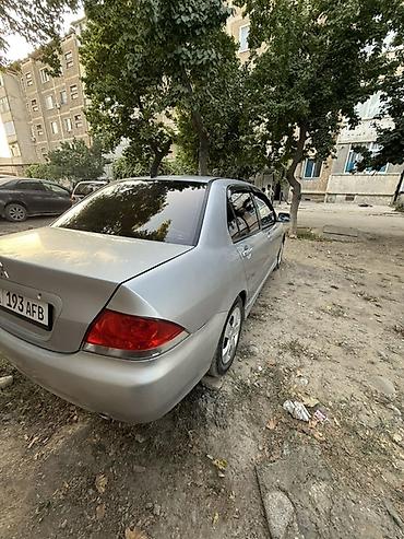 highlander platinum: Mitsubishi Lancer: 2003 г., 1.6 л, Механика, Бензин, Седан — 7