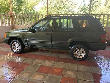 Jeep: Jeep Grand Cherokee (ZJ), tünd yaşıl rəng, V8 mühərrik. Texniki və — 2