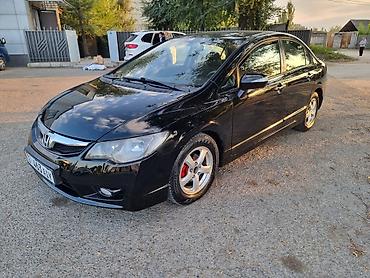 тормозные суппорта: Honda Civic: 2009 г., 1.3 л, Вариатор, Гибрид, Седан — 1