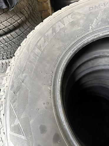 шины 26570 r16: Зимние шины Bridgestone Blizzak DM‑V2 - Размер: 265/70 R16 - Индекс — 1