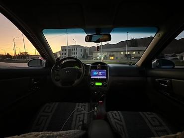 385 55: Продаётся седан Kia Cerato серебристого цвета. Автомобиль 4-дверный — 5