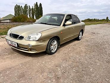 нур мото: Daewoo Nubira: 1999 г., 1.6 л, Механика, Бензин, Седан — 1
