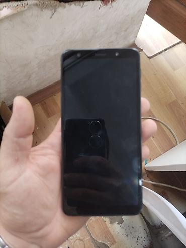 idmana aid sekiller cəkmək: Samsung Galaxy A7 2018, rəng - Göy, Barmaq izi — 1