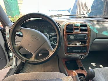 highlander 2: Kia Magentis: 2002 г., 2 л, Механика, Бензин, Седан — 5
