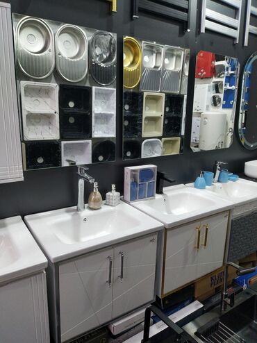 hamam ucun moydadirlar: Ağ rəngli keramika lavabo, alt hissəsində şkafı ilə birlikdə təklif
