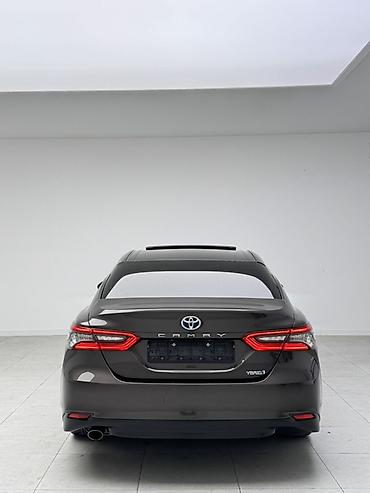 byd e2 2024: Toyota Camry: 2022 г., 2.5 л, Автомат, Гибрид, Седан — 3