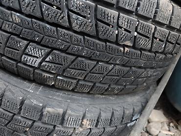 Шины: Комплект зимних шин 225/60 R17. На фото — 4 автомобильные шины без — 2