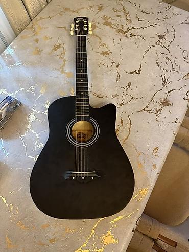 gitara yolana: Qara rəngli akustik gitara – cutaway dizaynlı - Korpus: dreadnought — 1