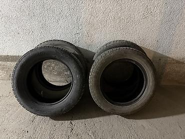 зимние шины 2056016: Комплект из 4 автомобильных шин Goodyear. Размер: 215/60 R16 — 1