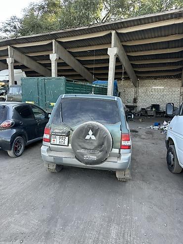 Транспорт: Mitsubishi Pajero iO: 2002 г., Автомат, Бензин, Внедорожник — 4