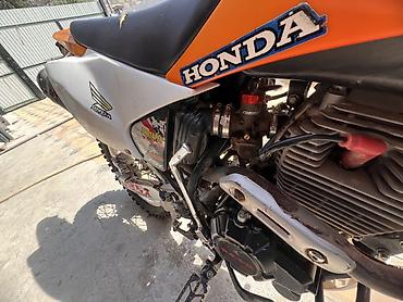 реплика мото: Мотоцикл эндуро/кросс Honda (оранжево-белый пластик). Особенности и — 1