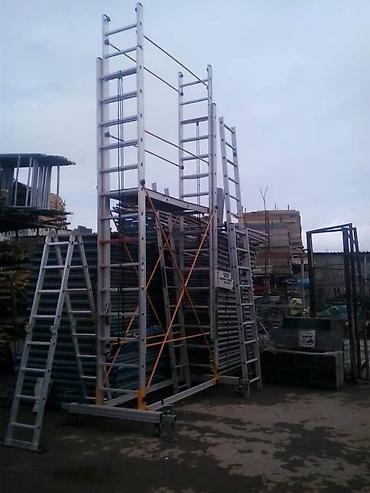 lesa icarəsi: Строительные леса —scaffold-demir ayaqaltilar tikintide — 4