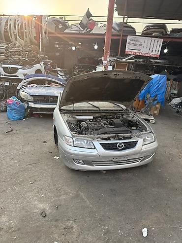 Mazda Capella/626 — на разбор - Кузов седан, серебристый цвет - at lalafo.kg Mazda Capella/626 — на разбор - Кузов седан, серебристый цвет -