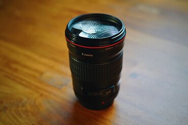 renu linza suyu: Canon EF 135mm f/2 USM Linza ideal vəziyyətdədir Şuşədə cızıq, toz