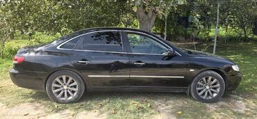Тарелки: Hyundai Grandeur: 2.7 л | 2008 г. Седан