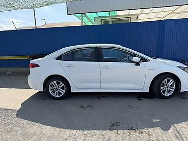 highlander 2017: Toyota Corolla: 2021 г., 1.8 л, Гибрид, Седан — 2