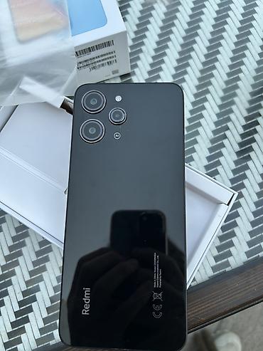 redmagic 10: Xiaomi Redmi 12, цвет Midnight Black. Конфигурация памяти: 8 ГБ RAM и — 4