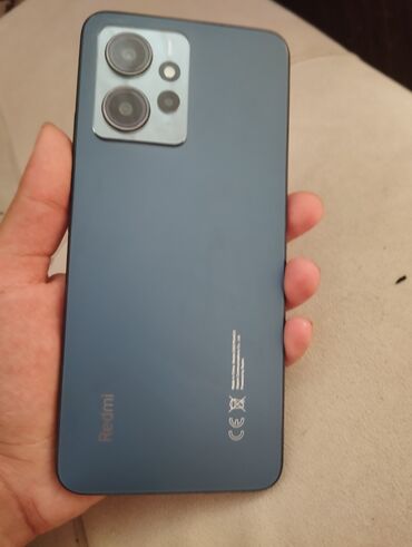 телефон fly lq239: Redmi Note 12, 128 ГБ, цвет - Черный, Гарантия, Сенсорный, Отпечаток пальца