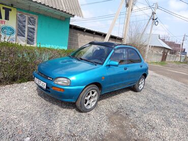 кичине машина: Mazda 121: 1992 г., 1.3 л, Механика, Бензин, Седан