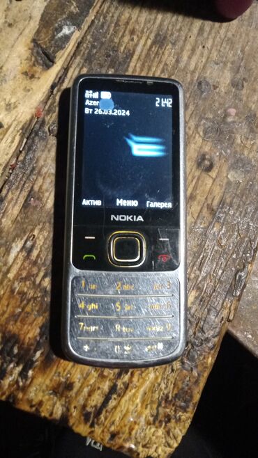 nokia lumia 900: Nokia 6700 Slide, < 2 GB Memory Capacity, rəng - Gümüşü, Düyməli