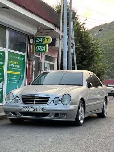 avtomobil şüşə silənləri: Mercedes-Benz E 320: 3.2 l | 1999 il Sedan