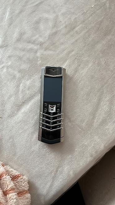 tissot touch: Vertu Signature Touch, Zəmanət — 1