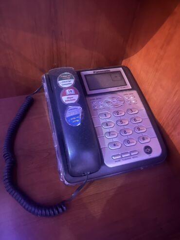 ishlenmish telefonlar: Stasionar telefon Panasonic, Simsiz