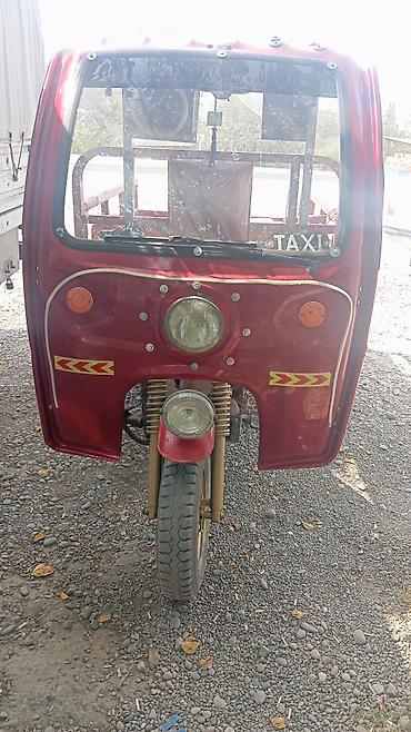 Motosikletlər: Yükdaşıma üçün üçtəkərli moto-transport (kabinli, açıq bortlu kuzov) — 1