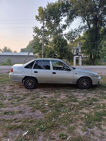 golf 2: Daewoo Nexia: 2009 г., Седан — 6