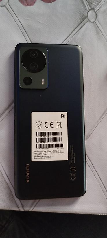 телефон fly fs521 power plus 1: Xiaomi 13 Lite, 128 ГБ, цвет - Черный, 
 Две SIM карты — 2