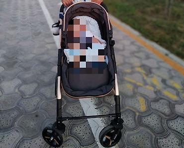 Modullu arabalar: Uşaq arabası – çoxfunksiyalı 2‑in‑1 tip. Rəng:qara (qızılı/bronza — 4