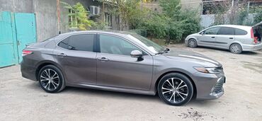 электирик машина: Toyota Camry: 2019 г., 2.5 л, Гибрид, Седан