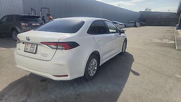 byd e5 2020: Toyota Corolla: 2021 г., 1.8 л, Вариатор, Гибрид, Седан — 5
