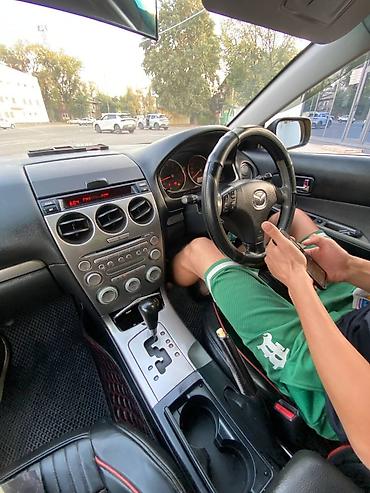 спортивный электромотоцикл: Mazda 6: 2002 г., 2.3 л, Автомат, Седан — 9