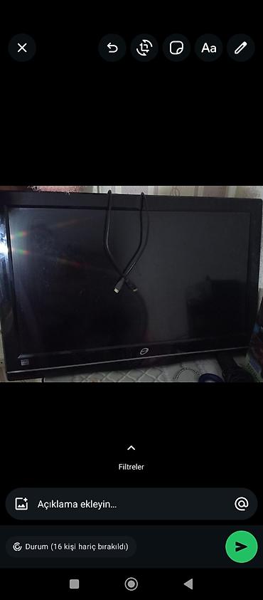 ekran sekli: LED/LCD televizor, təxminən 32–37 düym ekran ölçüsü. Qara rəngli — 2