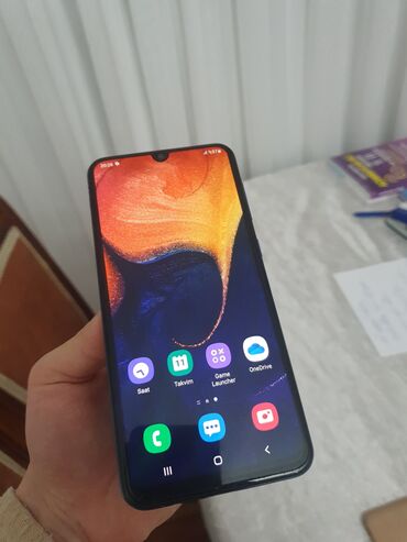 Samsung: Samsung Galaxy A50, 64 GB, rəng - Mavi, Sensor, Barmaq izi, Simsiz şarj