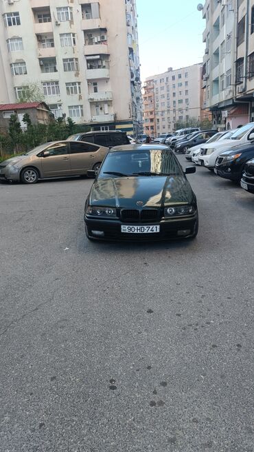 BMW: BMW 3 series: 1.8 l | 1996 il Sedan — 14