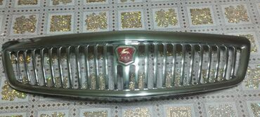 Oblisovkalar, barmaqlıqlar: QAZ markalı avtomobillər üçün radiator barmaqlığı. Üzərində şirkət