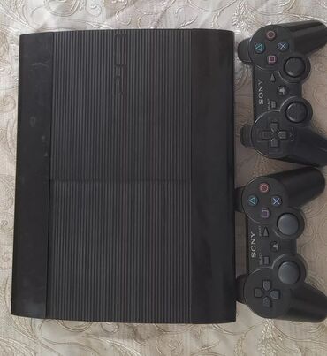 PS3 (Sony PlayStation 3): Ps3 slim satilir 17 oyun yuklenib ve 7 disq,1pult hediyye verilir evde