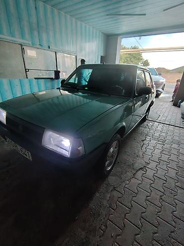 Tofas: Model: Tofaş Şahin (sedan) Kuzov: 4 qapılı, açıq yaşıl rəng Yanacaq — 6