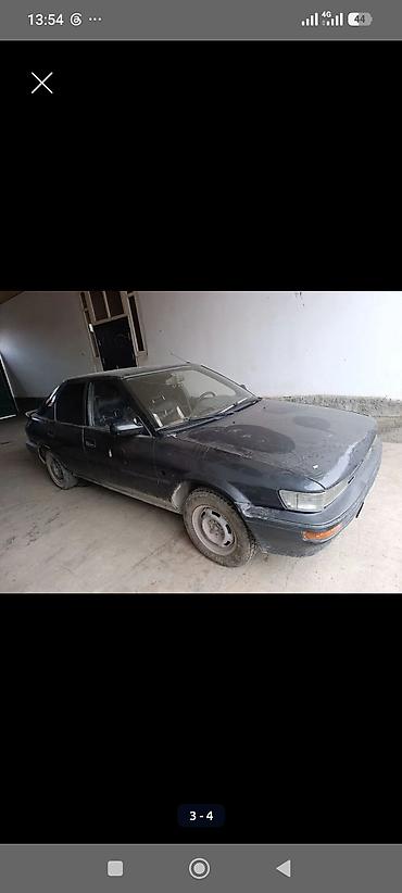 Унаа: Toyota Corolla: 1990 г., 1.3 л, Кол менен иштөөчү, Бензин, Лифтбек — 2