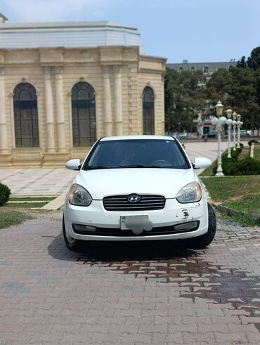 w210 ön bufer: Hyundai Accent: 1.6 l | 2006 il Sedan
